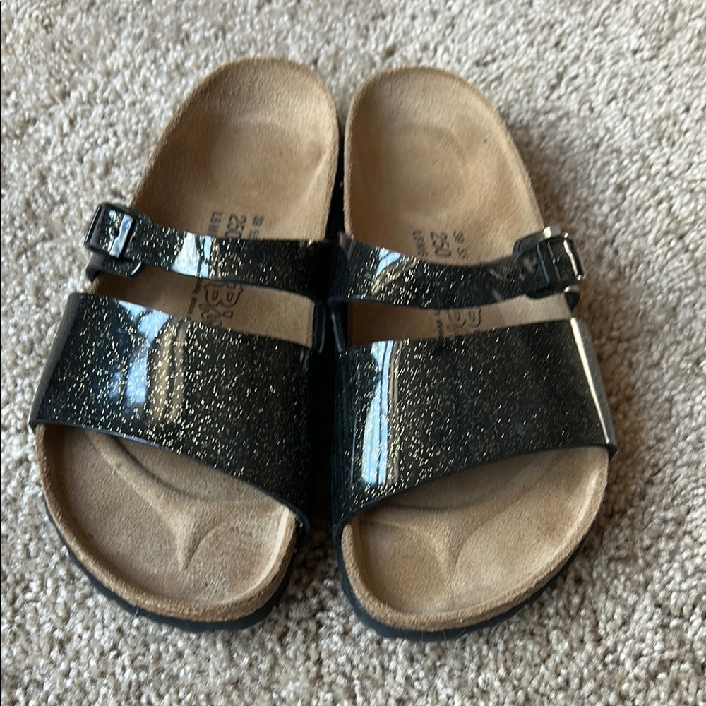 Birki’s black glitter sandals